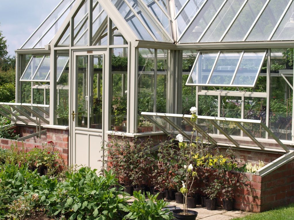 Greenhouse with cold frames built into the foundation.